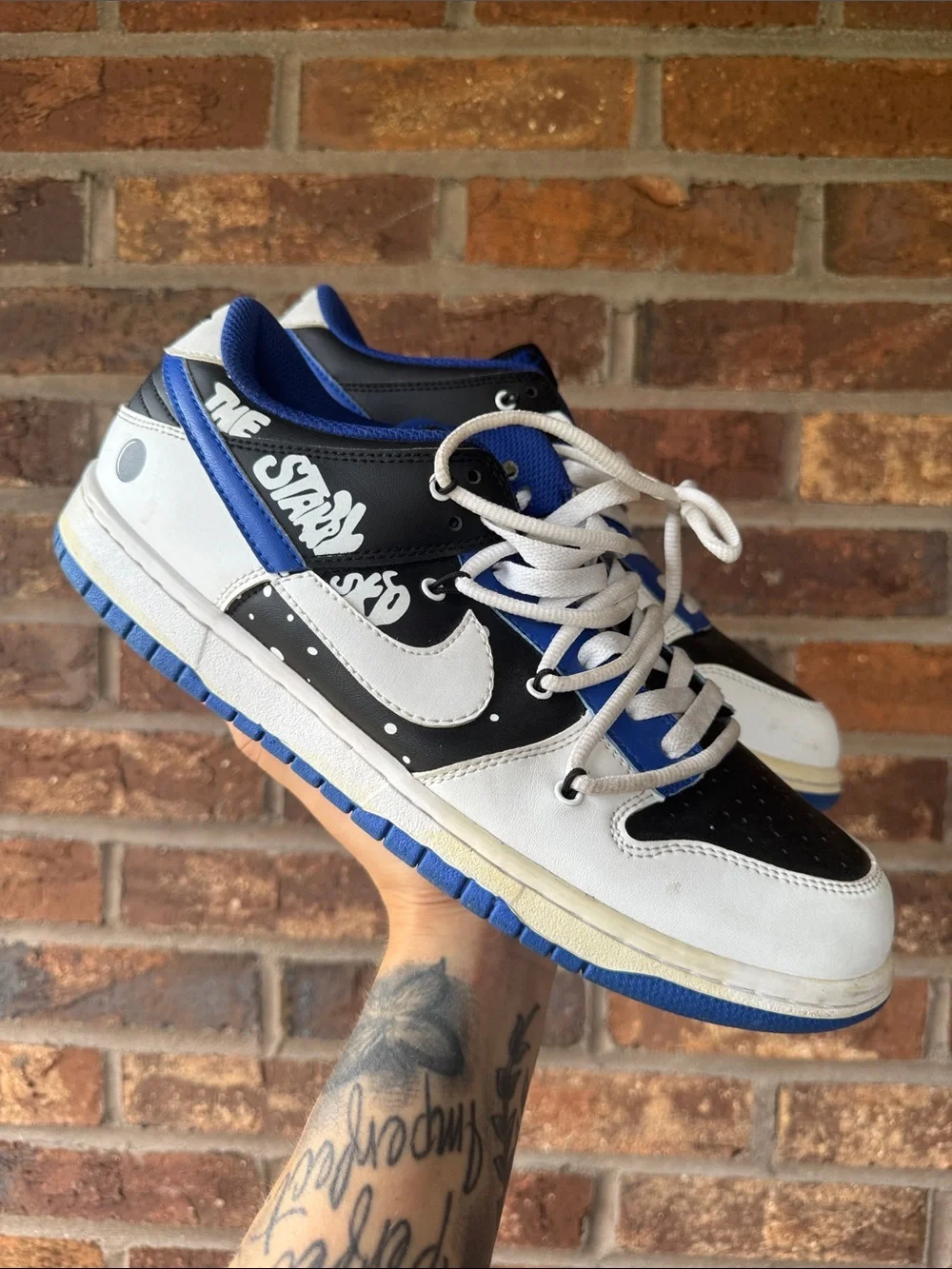 Nike Dunk Low — White, Black & Blue Graphic Accent Sneakers